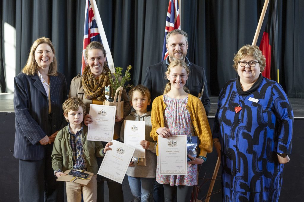 The Honourable Julie Collins, with the Botha family and Mayor Sally Doyle