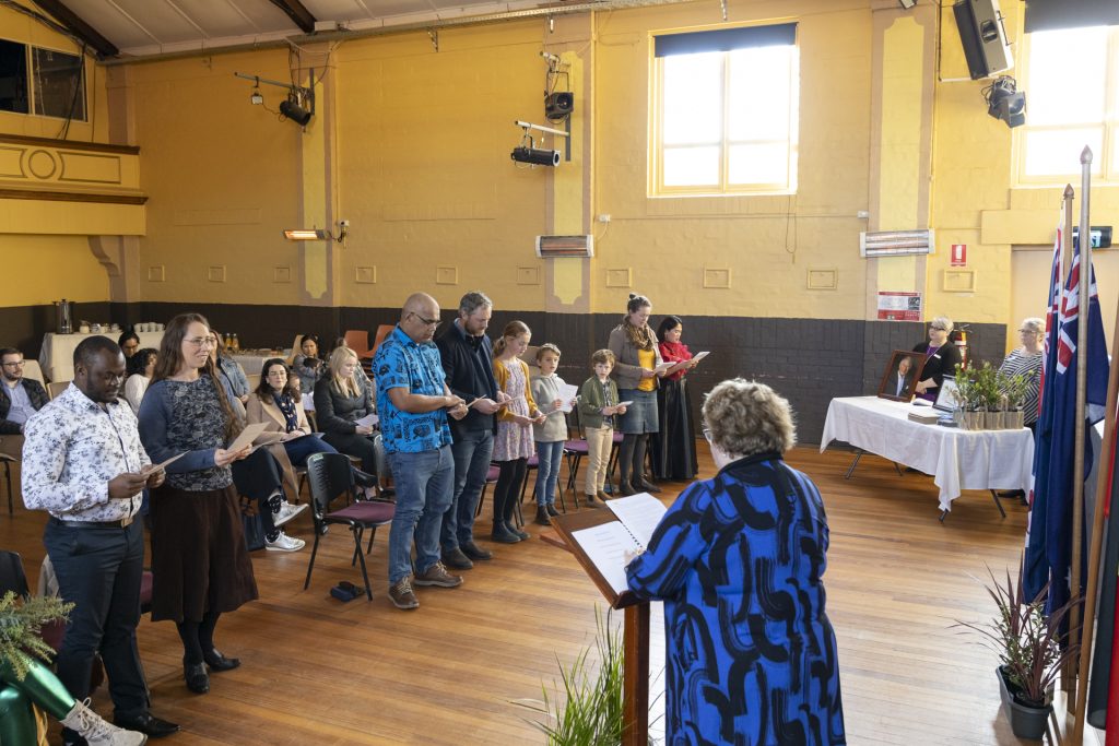 Mayor Sally Doyle administers the Pledge of Commitment